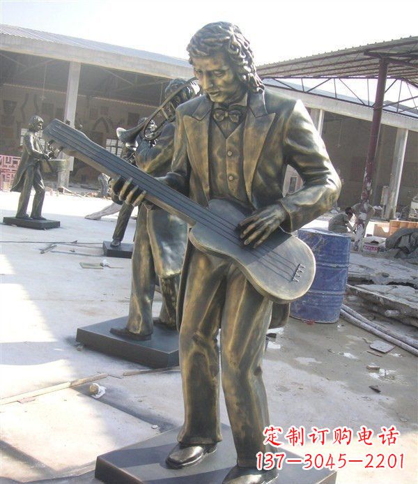沧州西方人物铜吉他雕塑