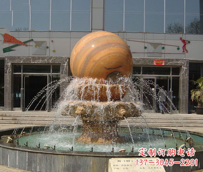 沧州石来运转球晚霞红风水球石雕