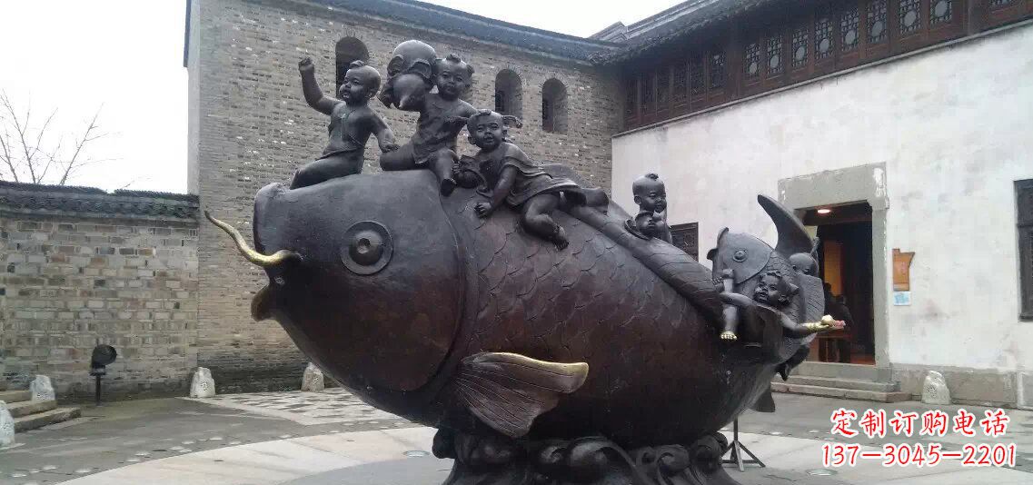 沧州小孩骑鱼铜雕